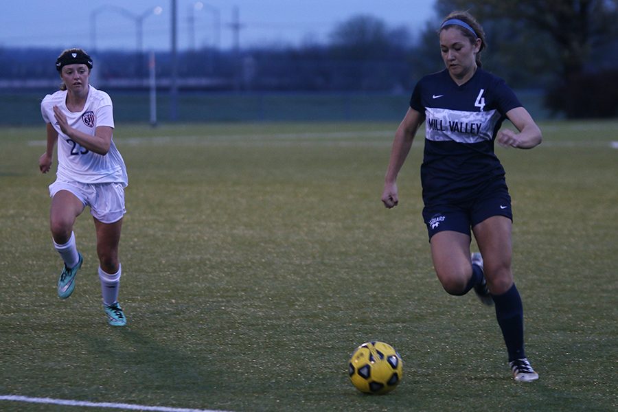 After receiving the ball, freshman Ella Shurley prepares to pass it downfield.