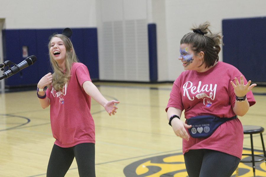 Juniors Kate Backes and Lindsey Edwards dance during open mic.