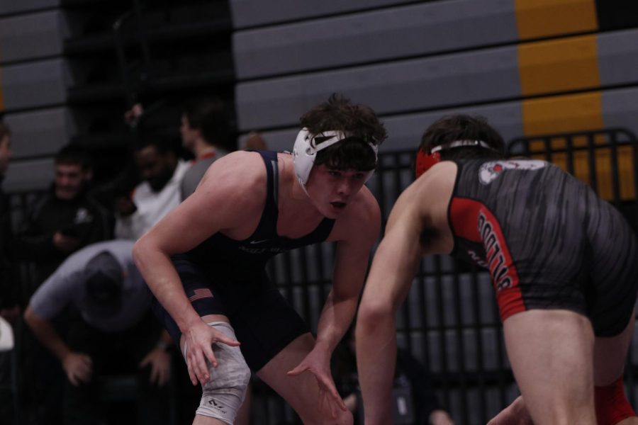 Senior Dylan Massey stares into his opponent's eyes waiting to strike.