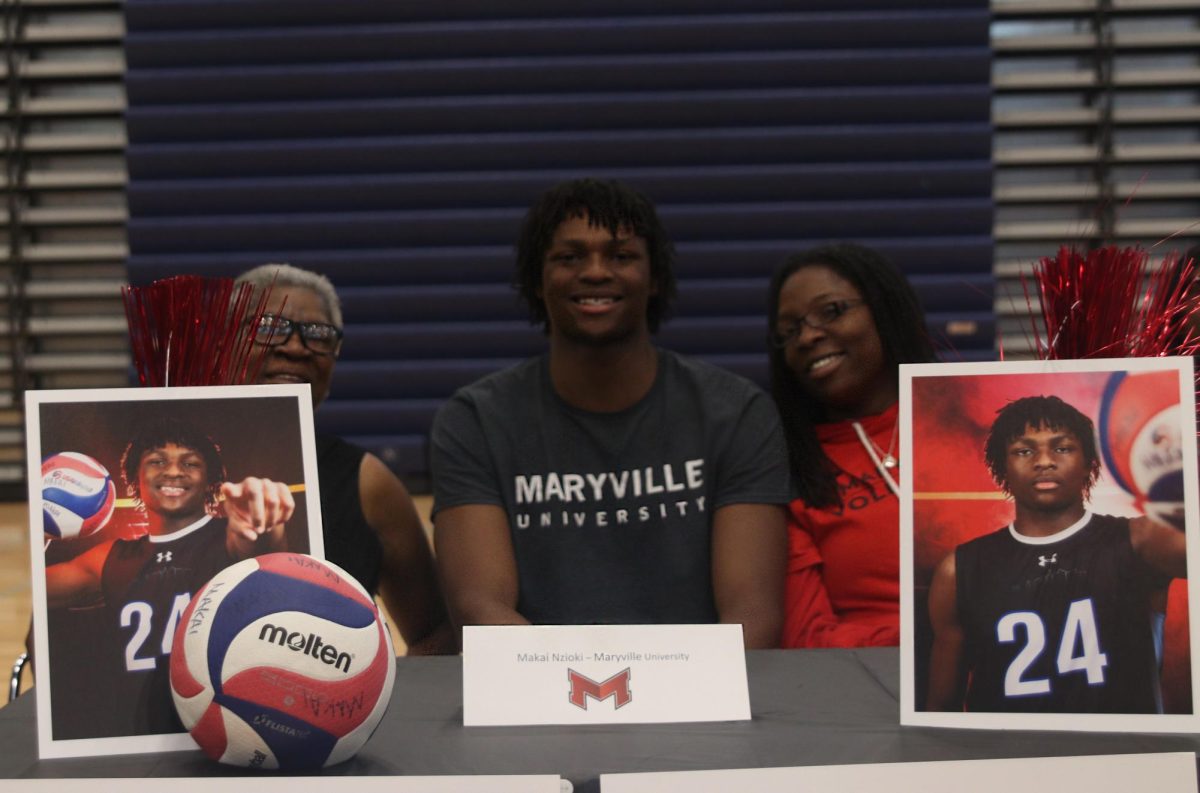 Signee senior Makai Nzioki signs with Maryville University for volleyball. 