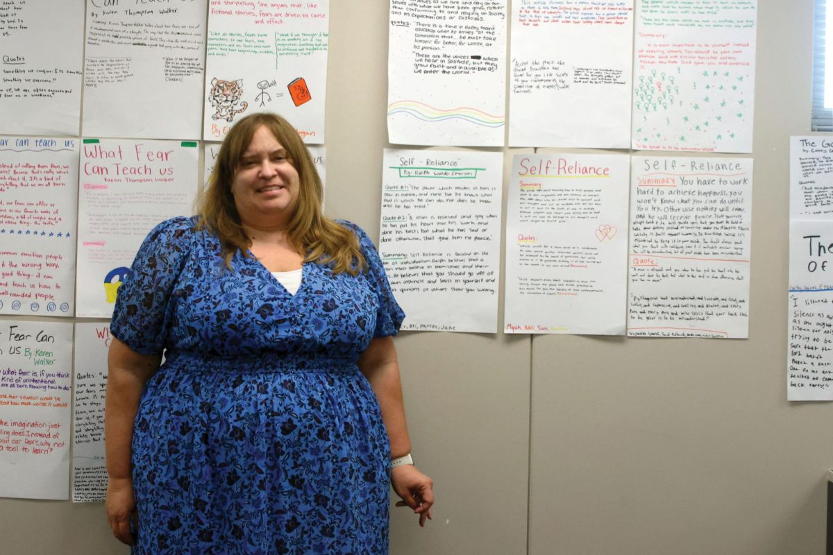 English teacher Sara Sedgwick decorates her room with educational student projects. 