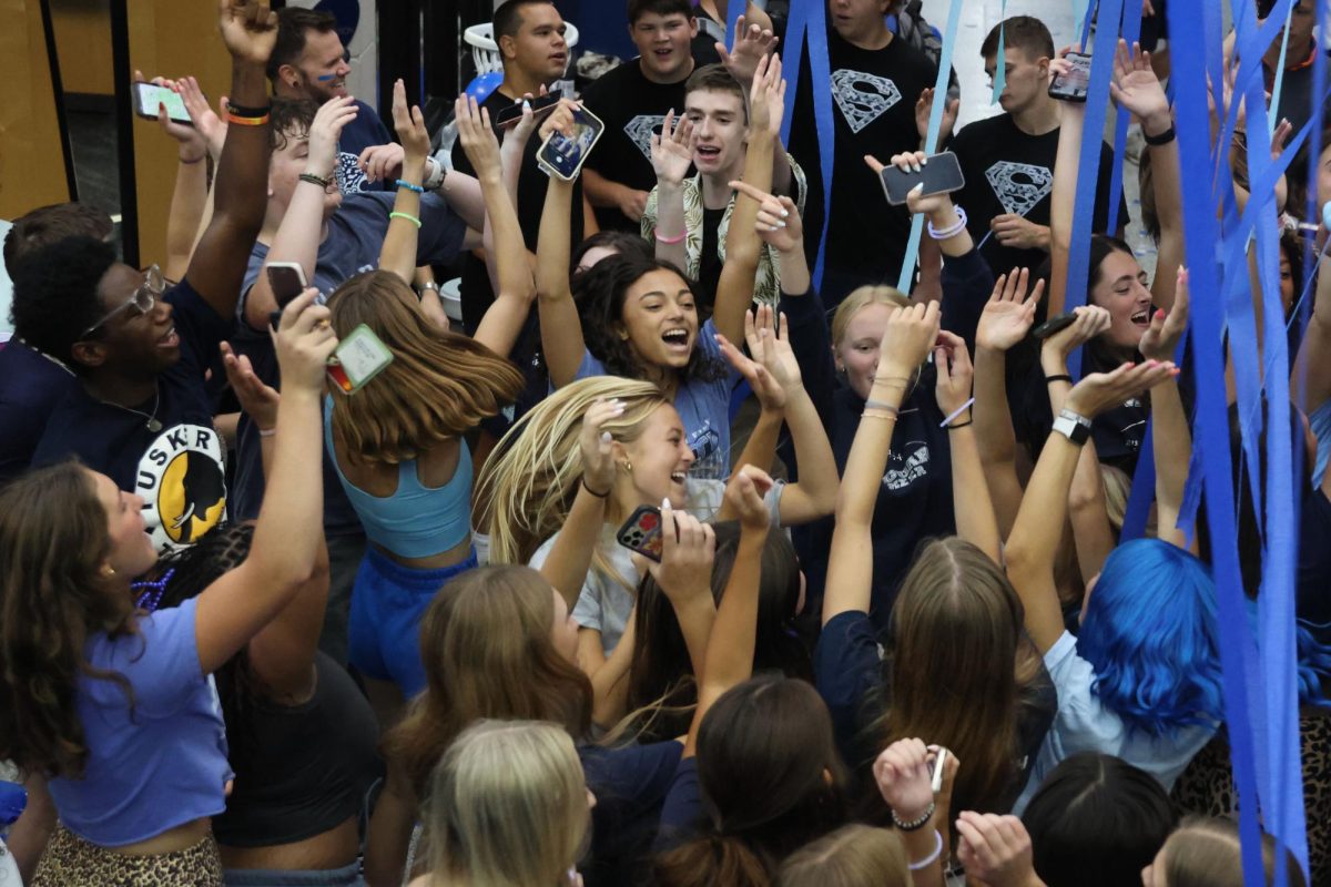 Jumping up and down, seniors enjoy the music and dance along to popular songs.
