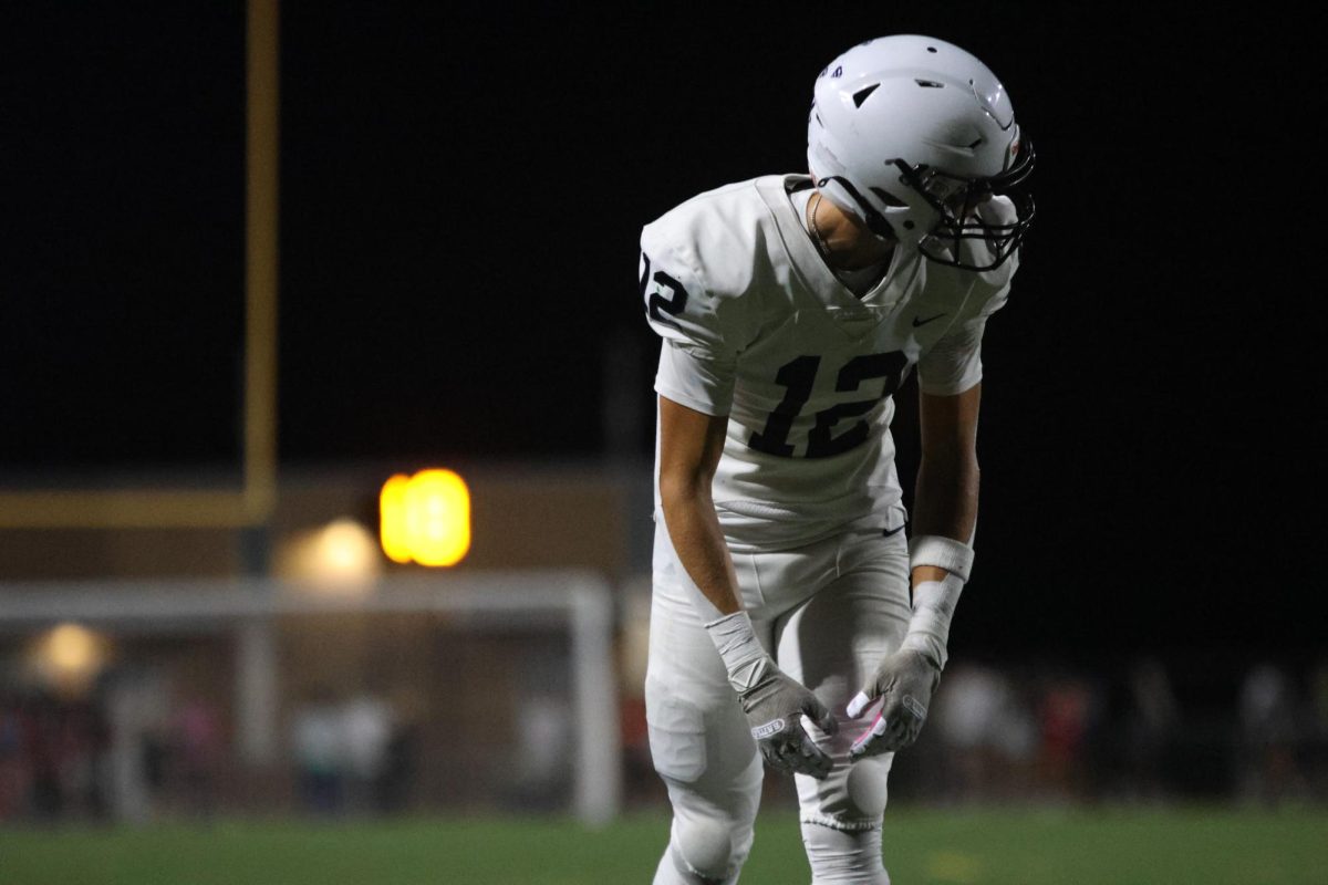 Junior Blake Jay waits for the next play.