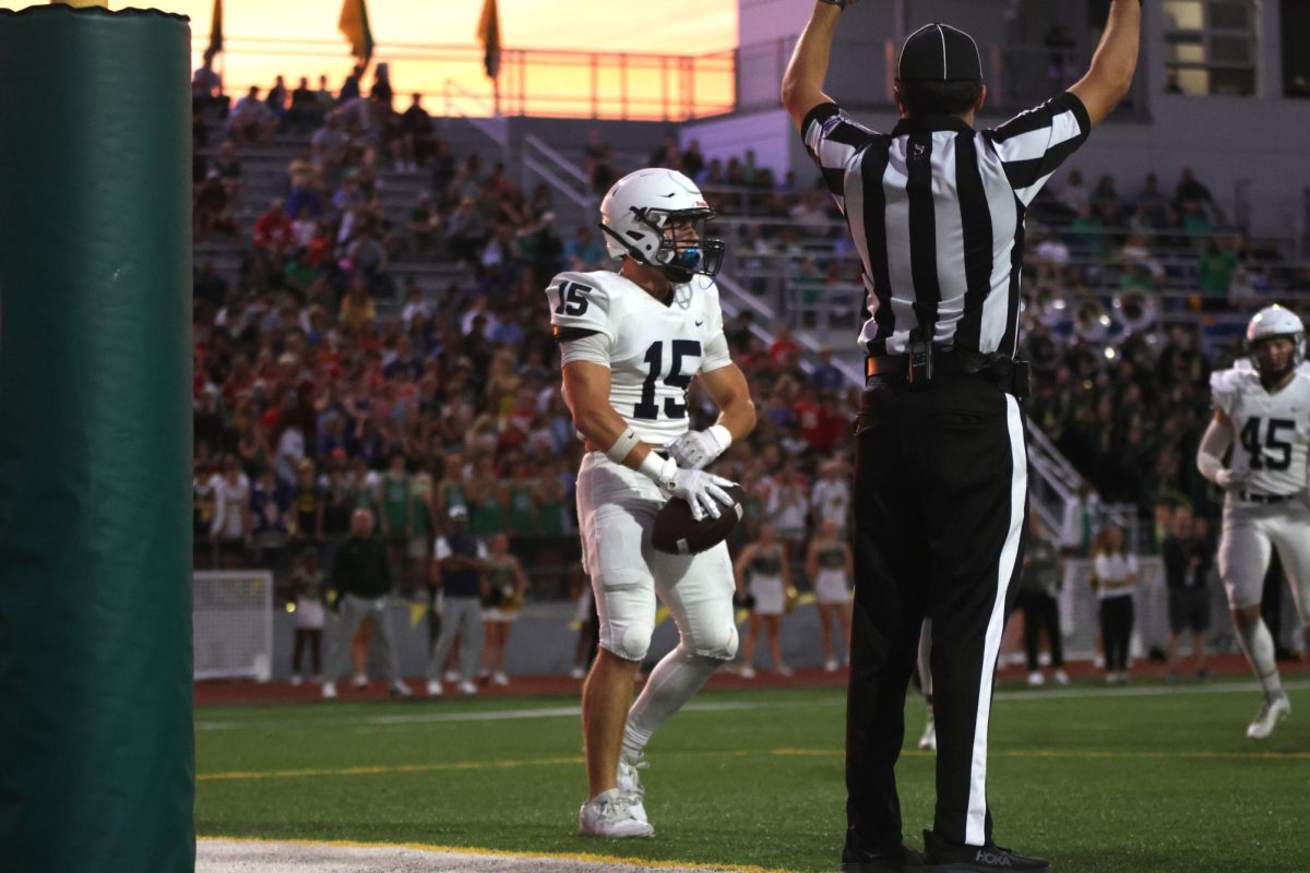 Senior Andy Watts celebrates his touchdown.