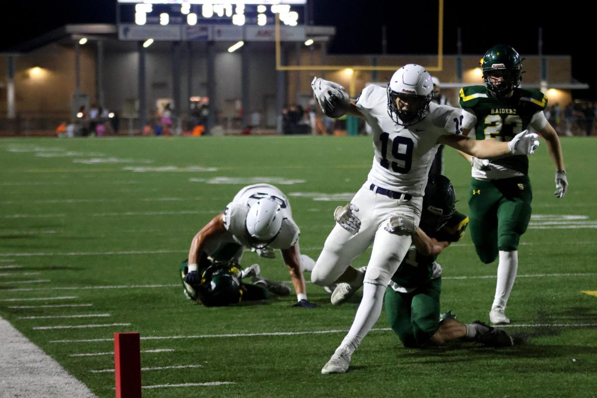 Sophomore Max Piva runs for a touchdown.