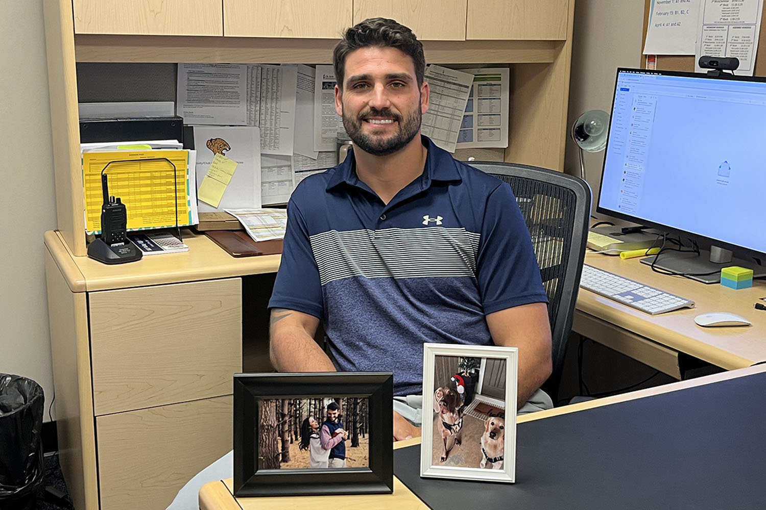 New assistant principal Dr. Heath Wilson appreciates his photos of his family. 