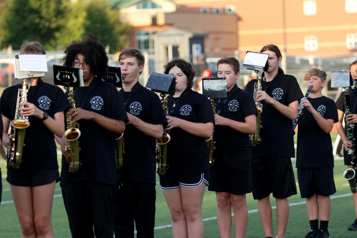 MV Band performs the National Anthem before the game begins.