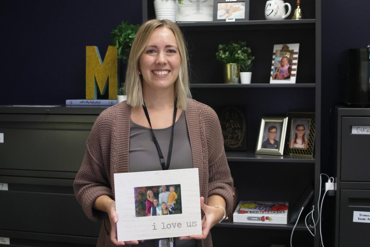 School psychologist Stacy Miller chose a picture of her family for an item that was important to her because it reminds her how much she loves them. 