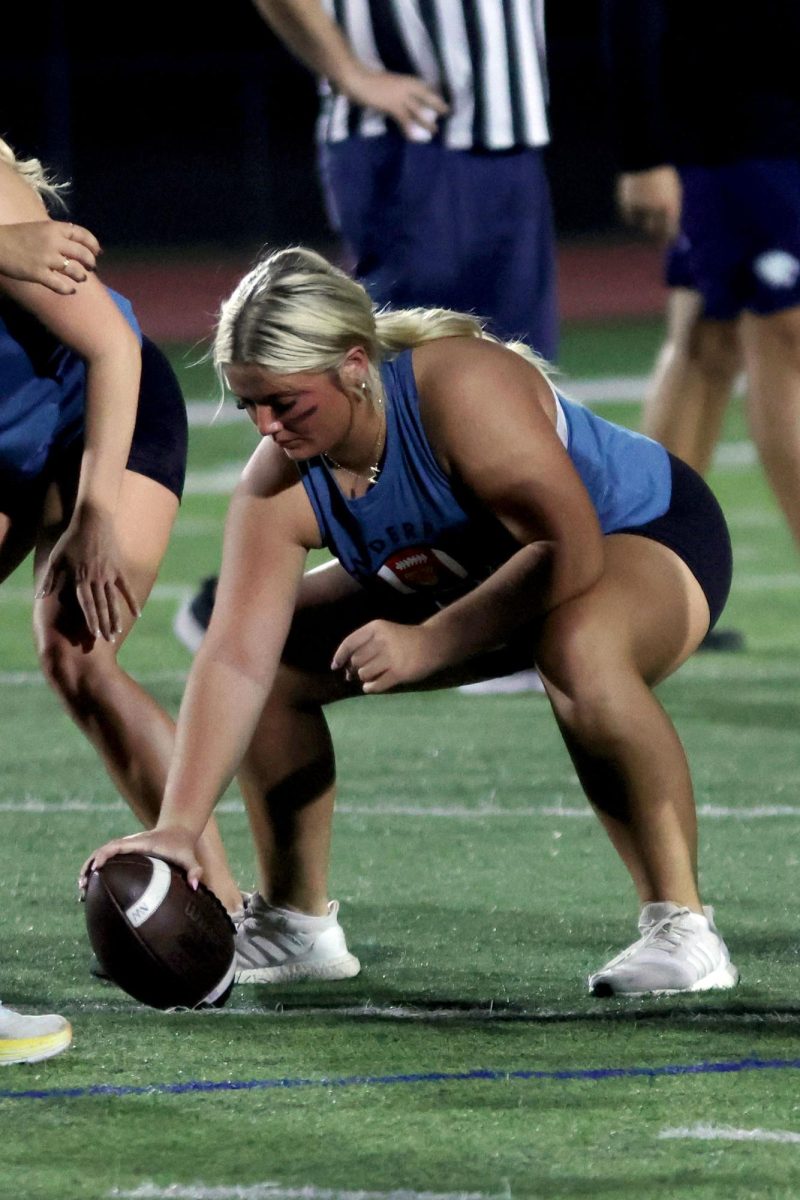 Senior Madeline Dibble prepares to snap the ball