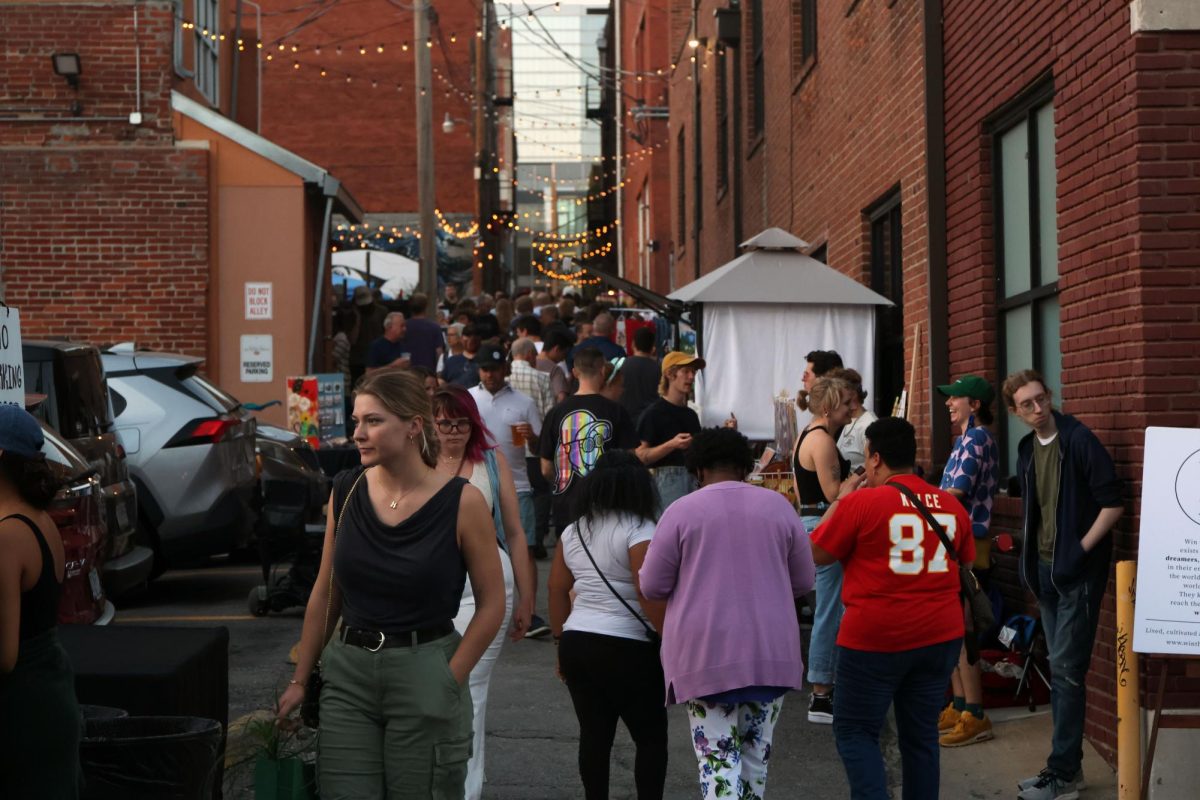 People crowd the alleyways at First Fridays event. 