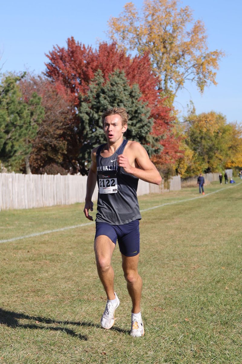 Looking ahead, senior Carter Cline begins his second lap around the course.