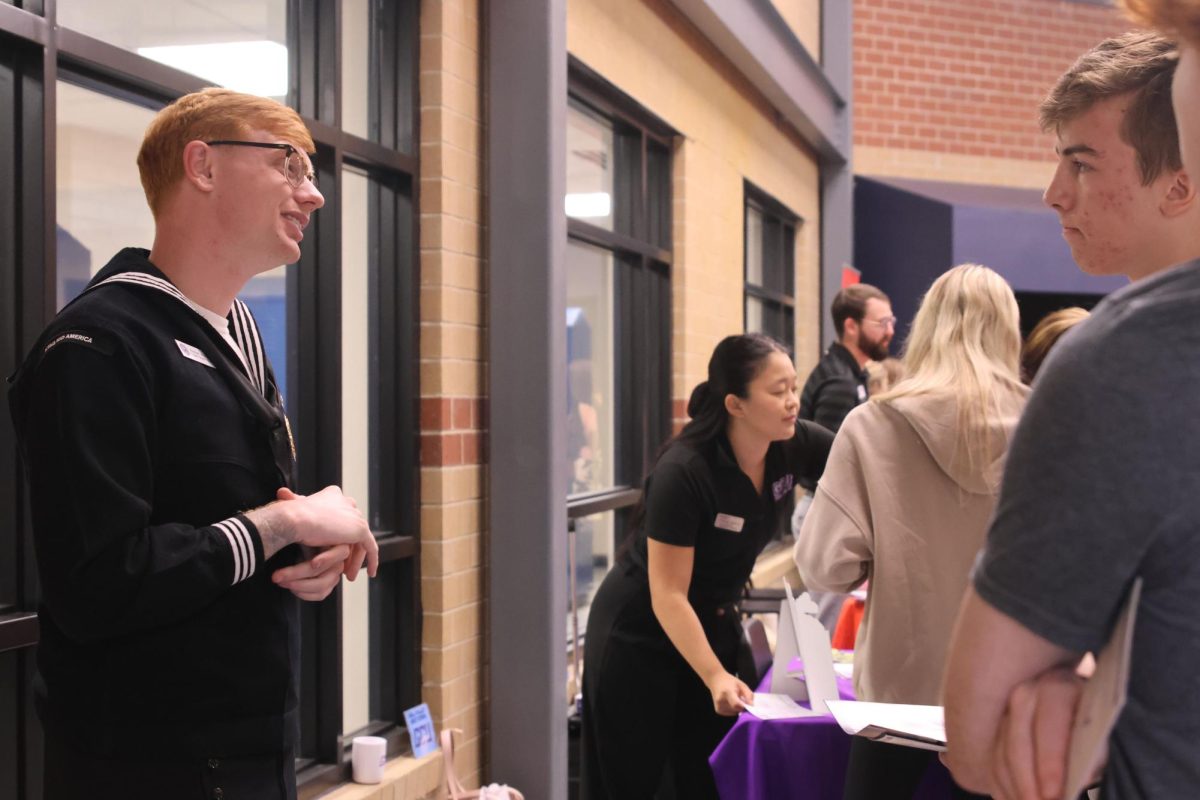 A recruiter from the U.S. Navy tells students about opportunities in the military.