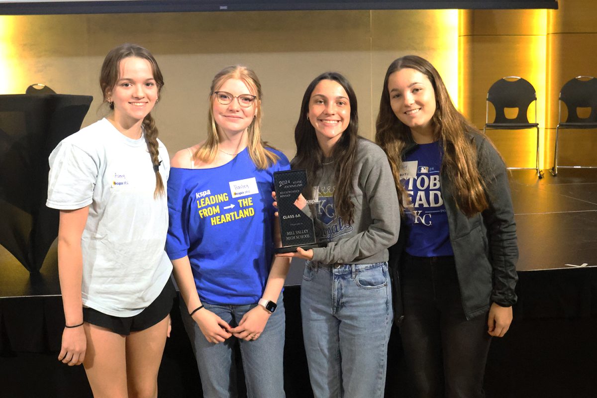 After winning the 6A sweepstakes Award Seniors Molly Griffin, Hailey Perrin, Avery Cole and junior Avery Clement pose proudly with their award. 