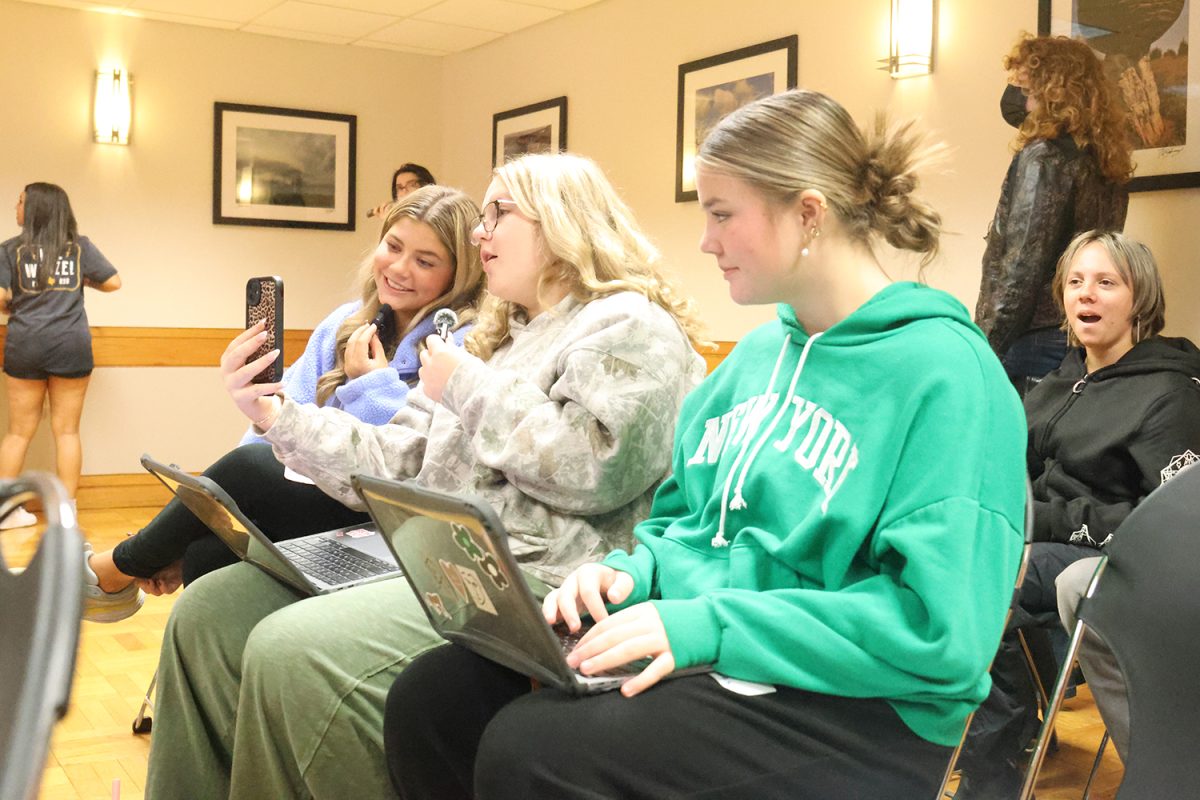 During a class at the KSPA fall conference Juniors Evie Grover, Emma Lee and Ava Mendez film a TikTok for the MVTV social media 