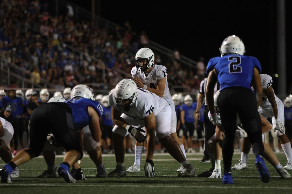 Senior Connor Bohon calls to snap the ball.