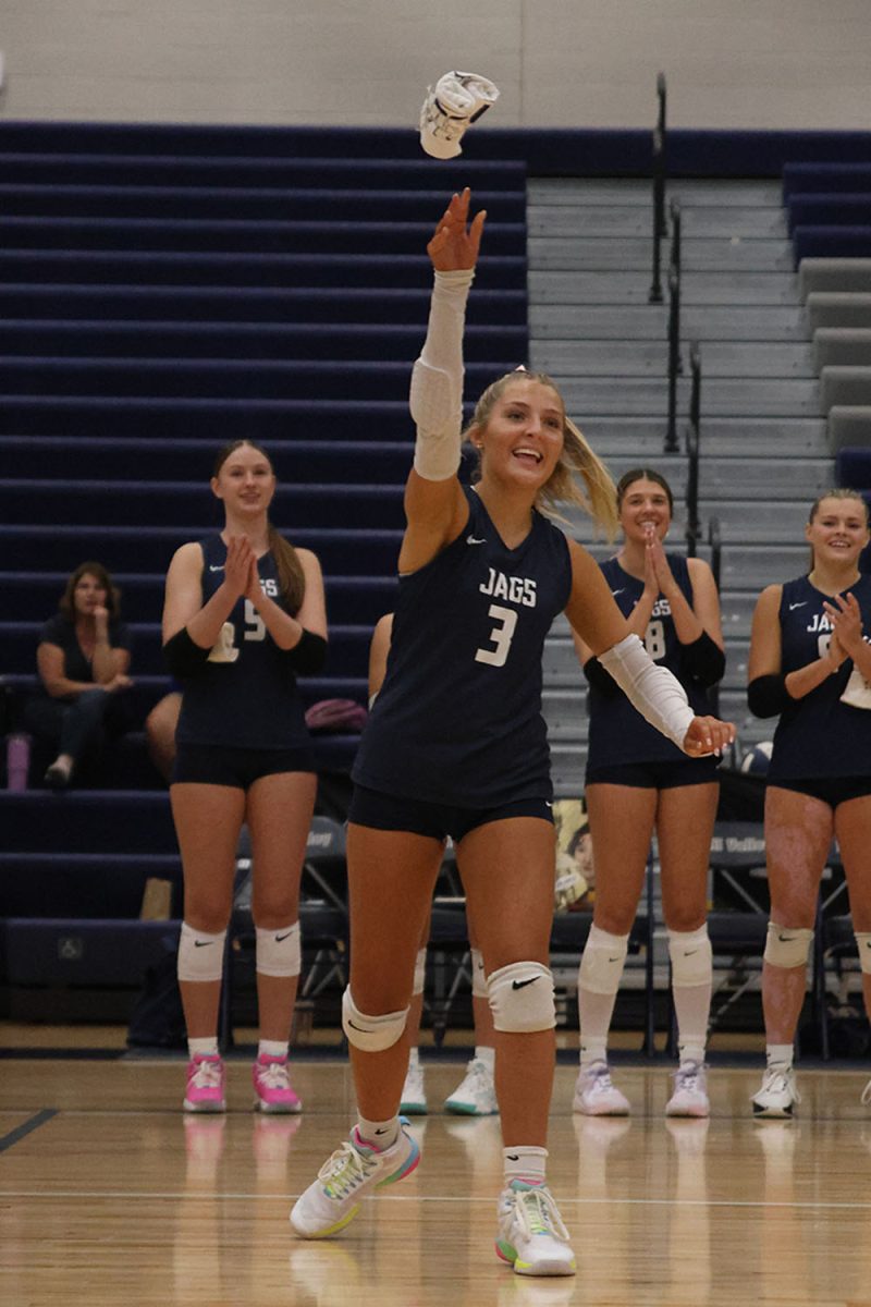 Stepping forward, senior Remi Ziebell throws a t-shirt to the crowd.
