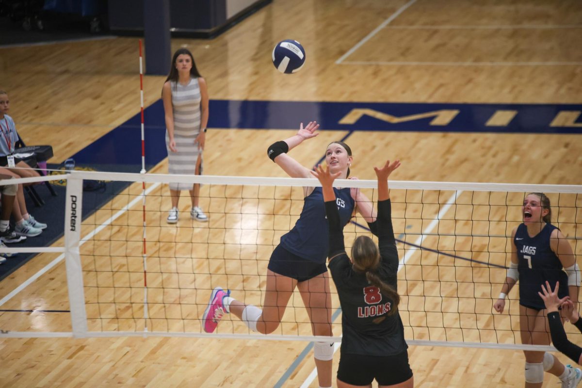 Senior Saida Jacobs leaps for the spike. 