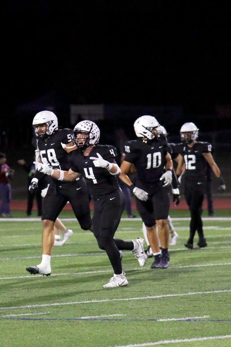 Senior Garret Clark gets hyped-up after a successful tackle. 