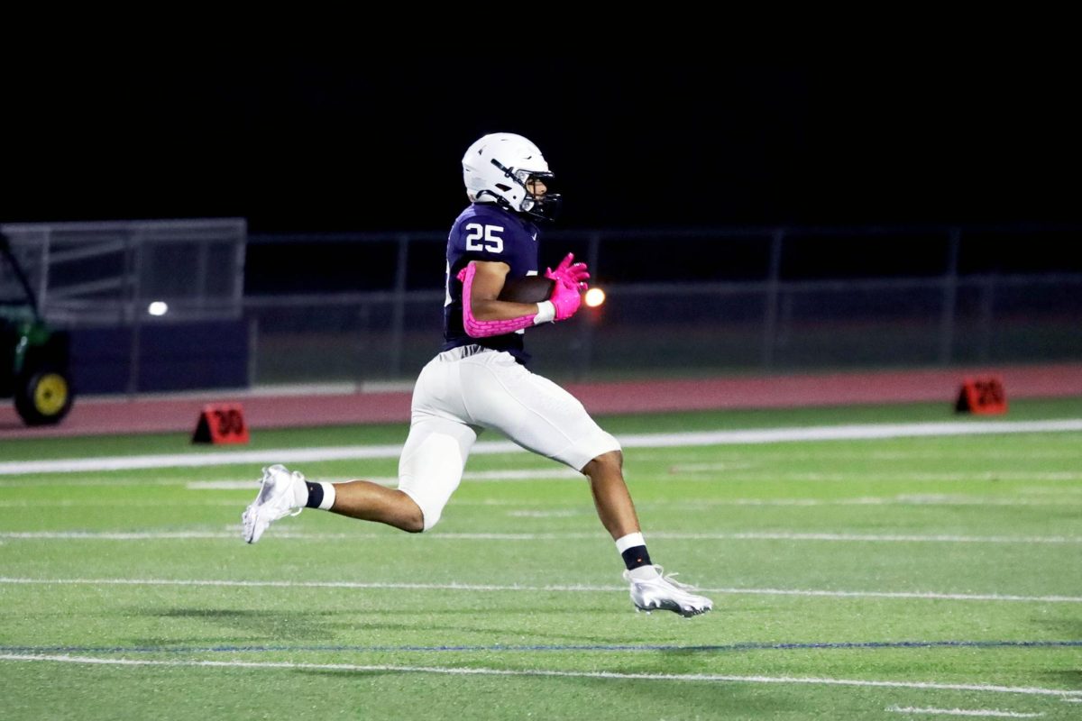 Junior Reggie Reece makes a run down the field.