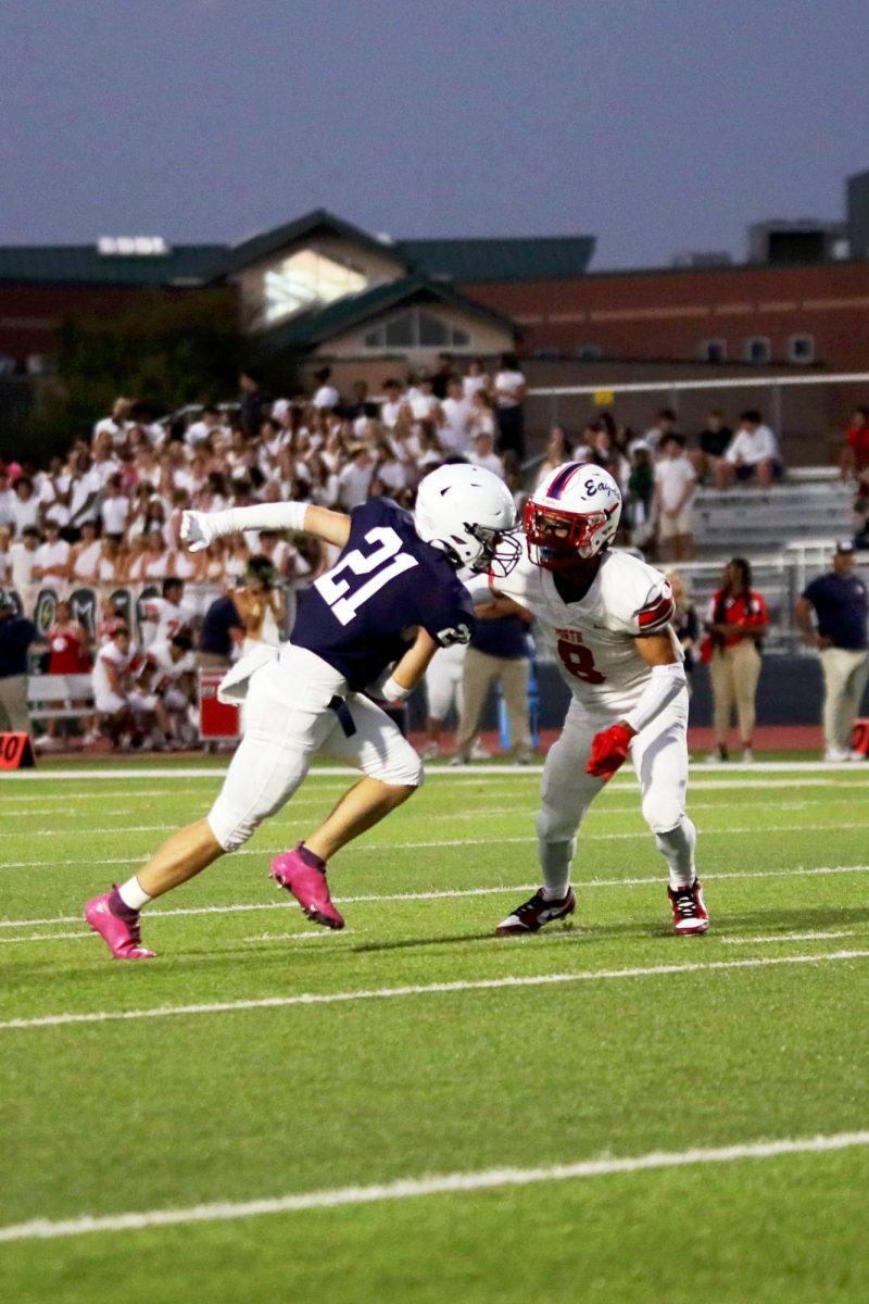 Senior Clayton Sondgeroth dodges a defender while making a run down the field.