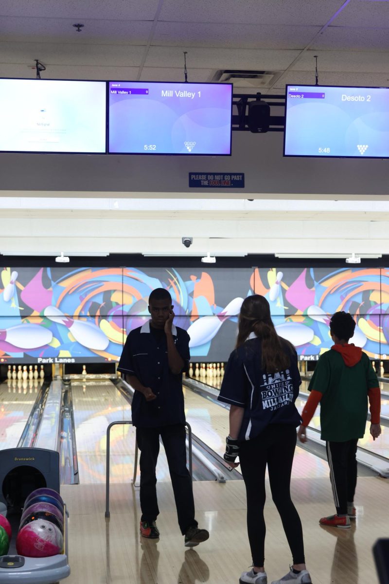 Senior Adairius Newton walks back after hitting all but two pins during his frame. 