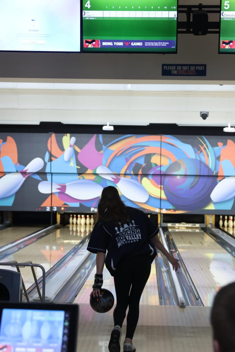 Bowler junior Layla Gonzales swings the ball behind her before she releases it into the lane. 