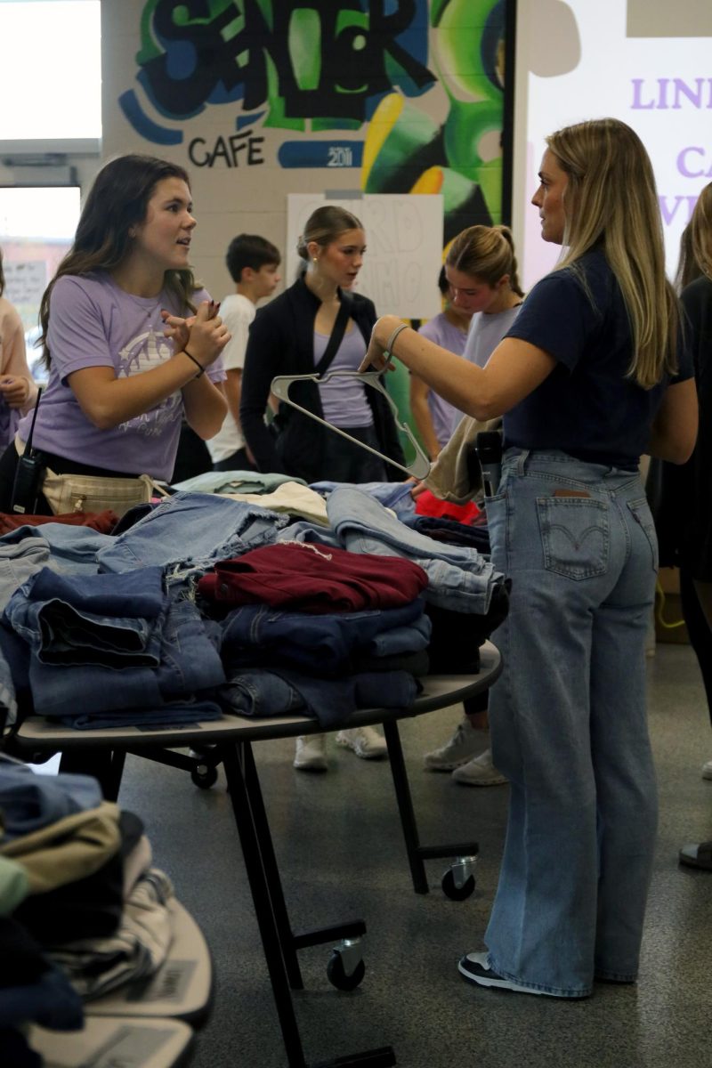 Relay For Life sponsor, Kirsten Jones talks to RFL Chair, senior Brynn Shideler about the event. 