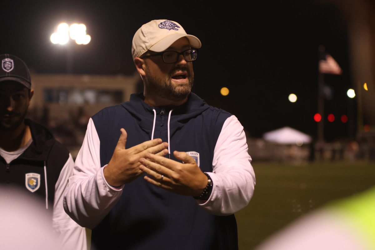 Talking to the team, Coach Crawford explains what they could do better in the next play, Nov.4.