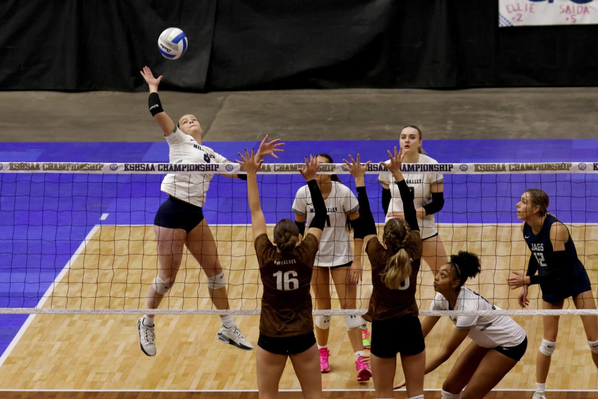 Mid air, senior Brekhan Waters gets the kill against Garden City.