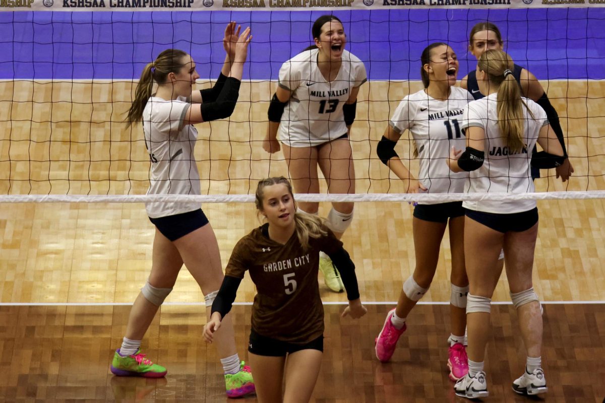 Jags celebrate after a play against Garden City.