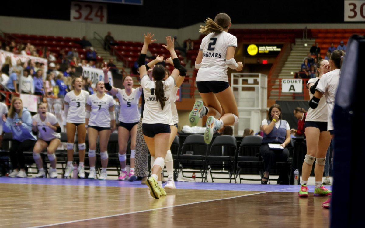 After the game point against Olathe West, the Jags celebrate.