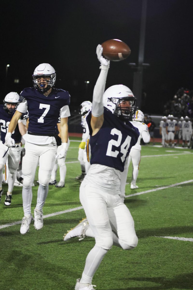 Junior Jenner Scobee runs the ball to the team after recovering the other teams fumbled ball. 