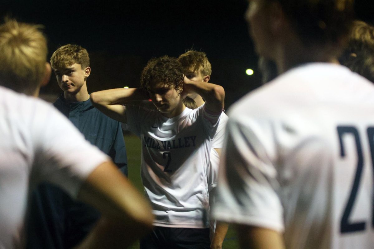 Hands raised to his head, junior team captain Landon Vincent looks down defeated after a season ending loss of 0-3. 