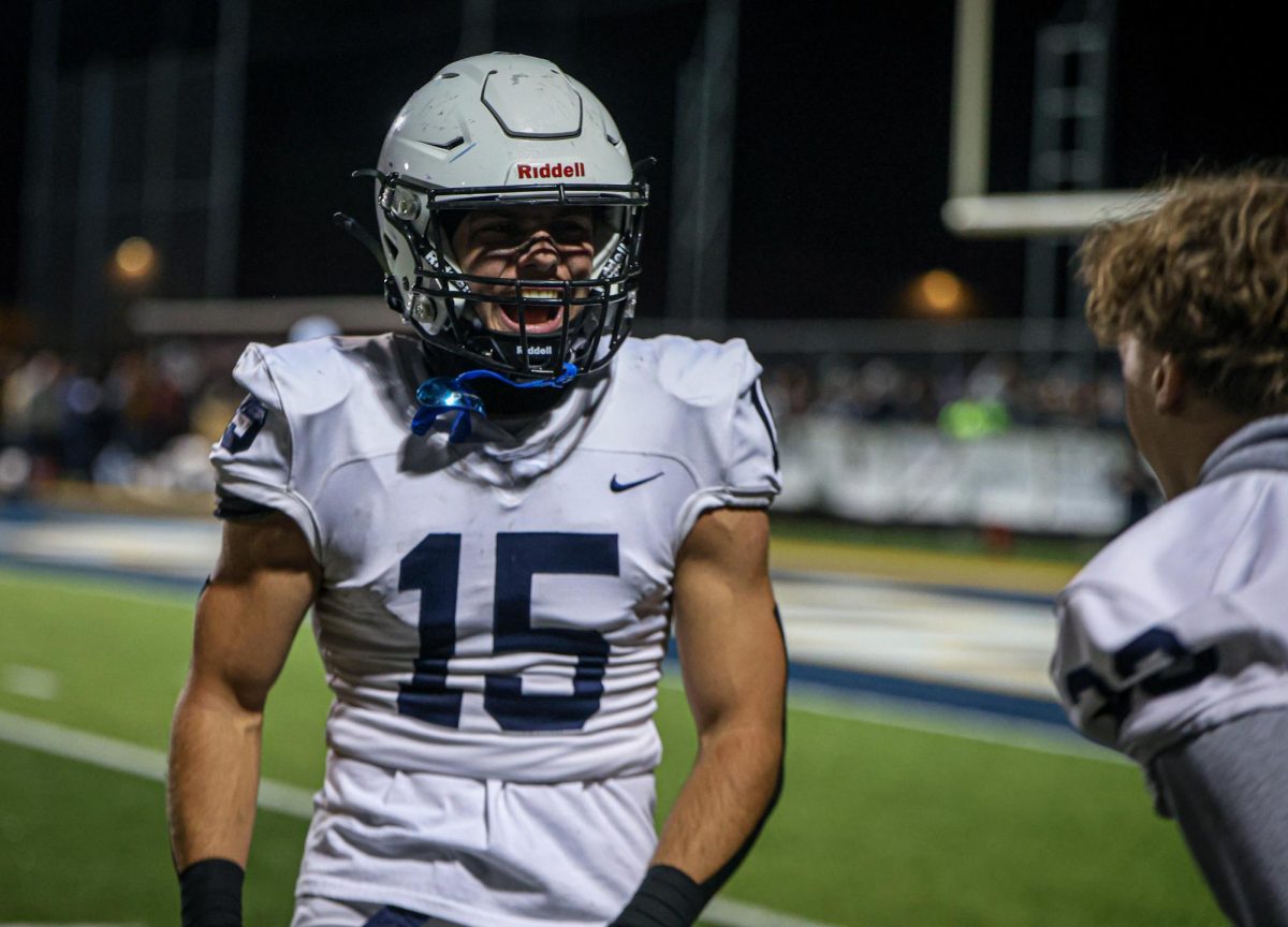 After a touchdown, seniors Andrew Watts and Grayson Moore celebrate.