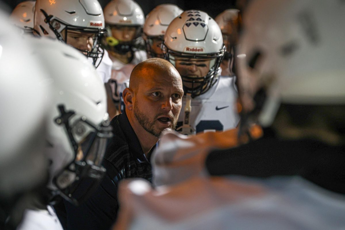 Hyping up the offensive line, associate head coach
 Jamie Resseguie gives his pregame speech. 