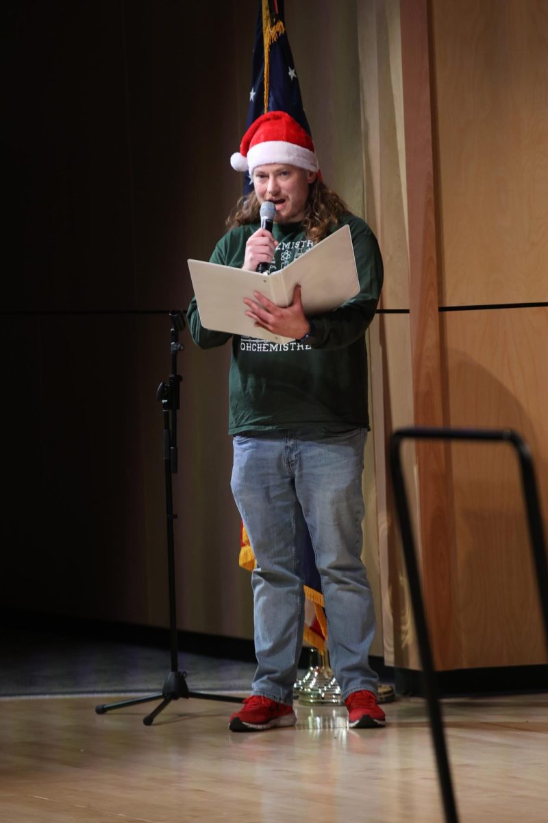 Reading his script, science teacher Neil McLeod voices Krampus in “A Christmas Tale."