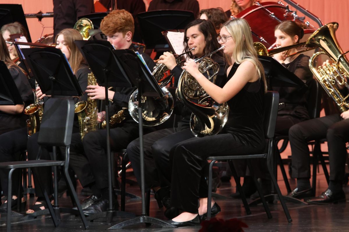 Focusing on the music, senior Marissa Akehurst performs in the symphonic band.
