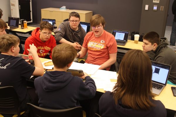 presenting the instructions, junior Ian Weatherman tells his team what they need to do next on Thursday, Dec.12.