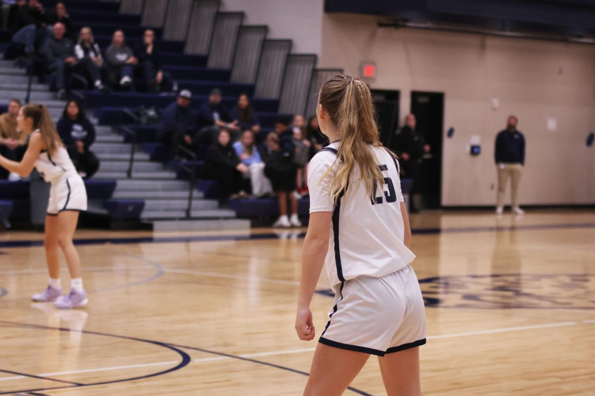 Sophomore Riley Marshall keeps her eye on the ball as it came down the court. 