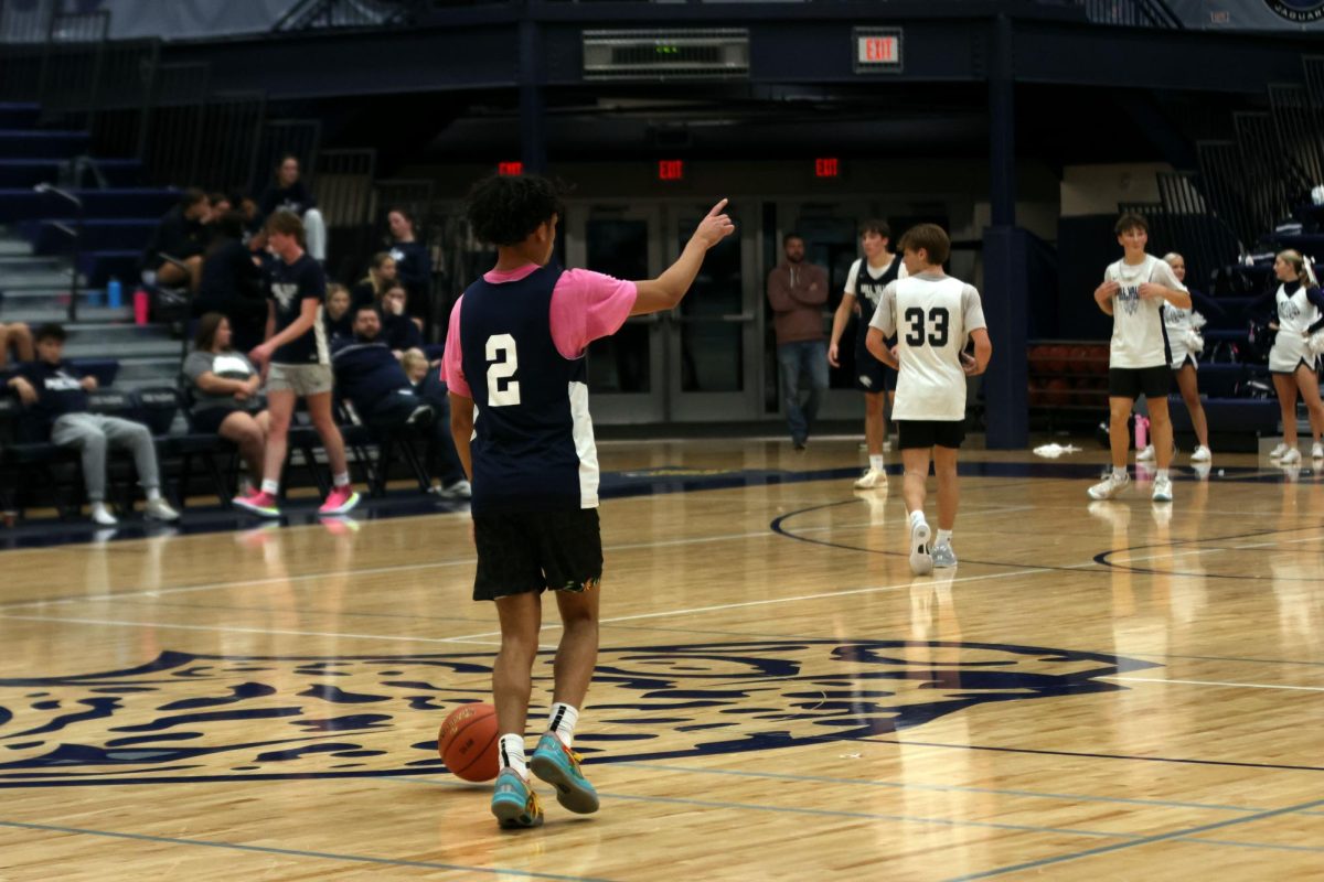 Jahkai Carter calls a play in a scrimmage on  Friday December 6