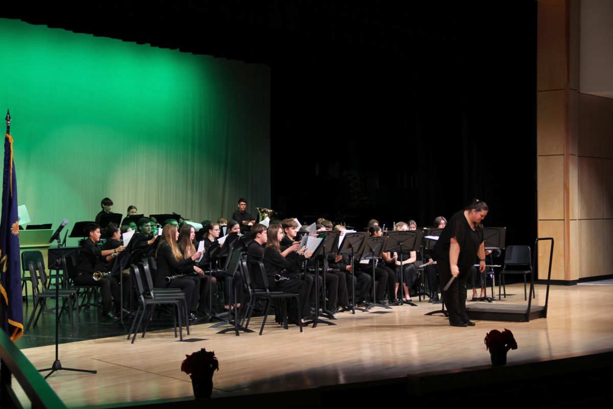 Conductor Jennifer Whyte concludes the concert band portion of the concert after themes from “The Nutcracker.”