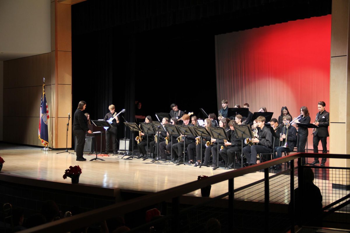 Band director Deb Steiner conducts the jazz band to “Now’s the Time” starting off the concert. 