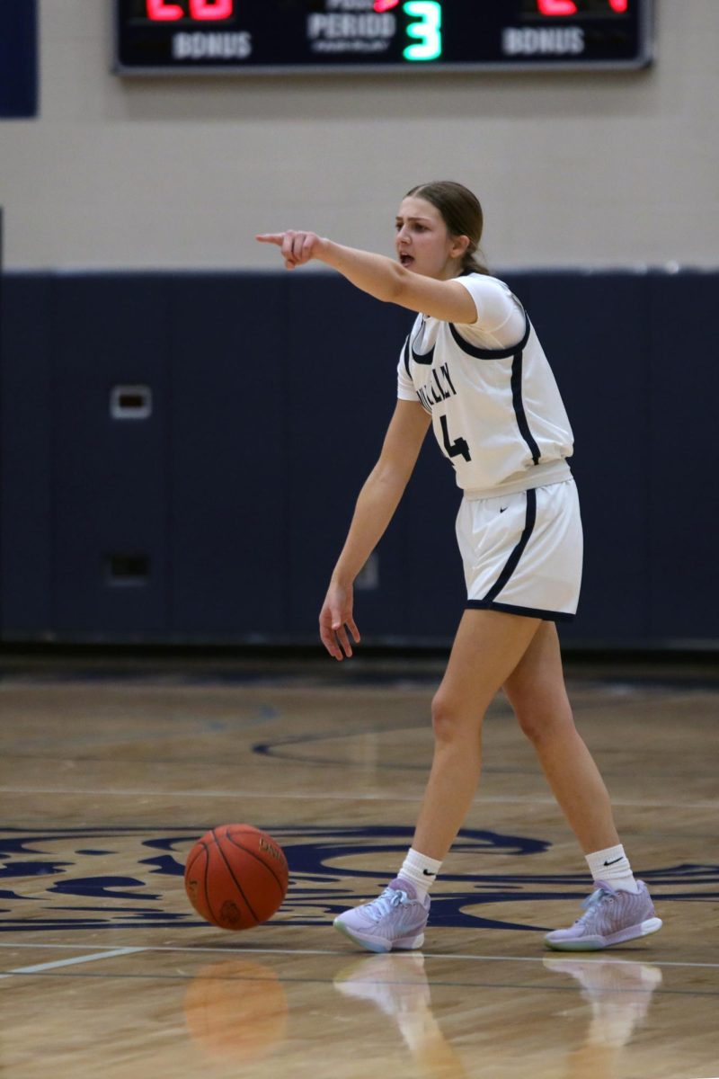 Pointing up the court, senior Averie Landon directs her team.