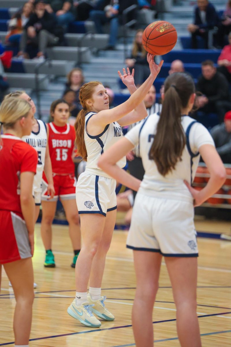 Free throwing, junior Leah Konen shoots the ball for a point. 
