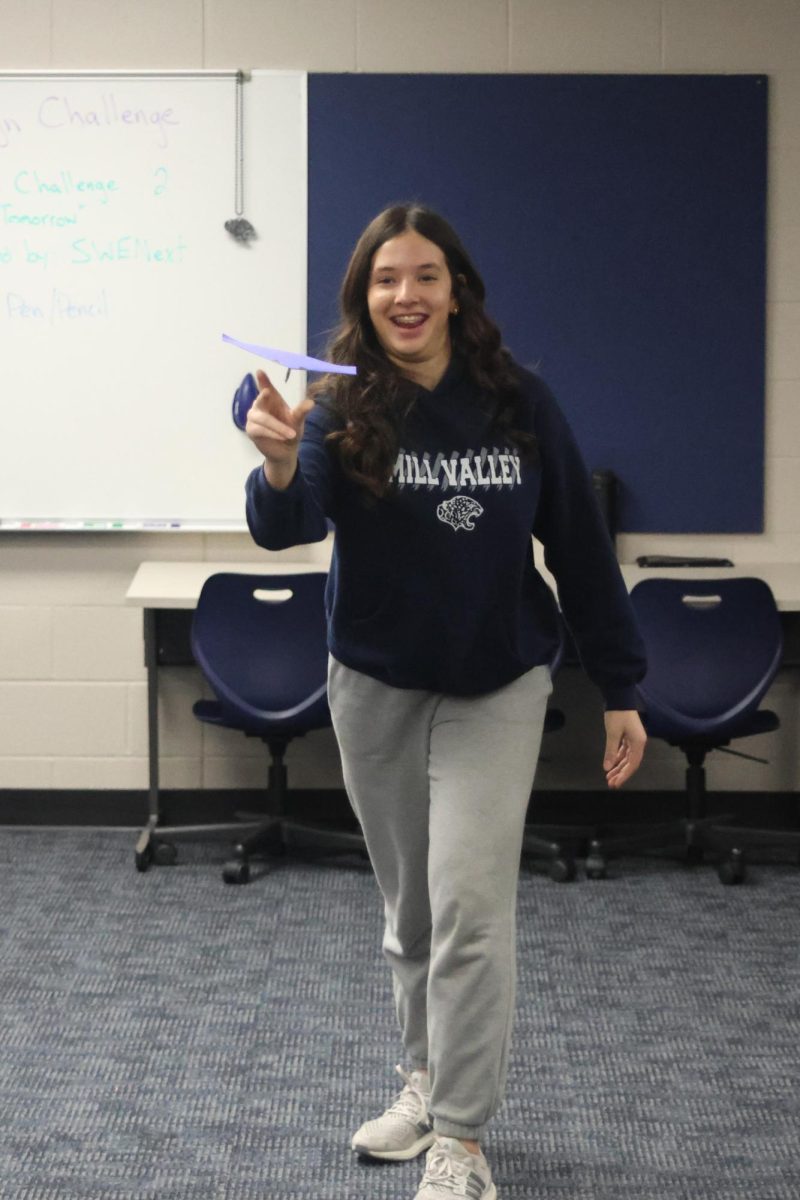 Freshman Sophia Sturdy lets go of her plane, aiming to take first place in the competition. 