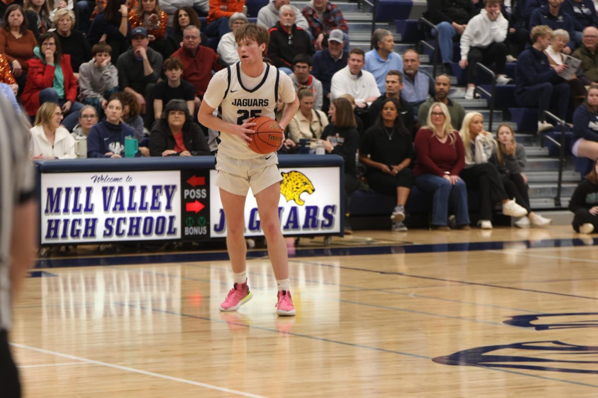 Senior Carter Kaifes looks to pass to his teamates Friday Jan. 31. 