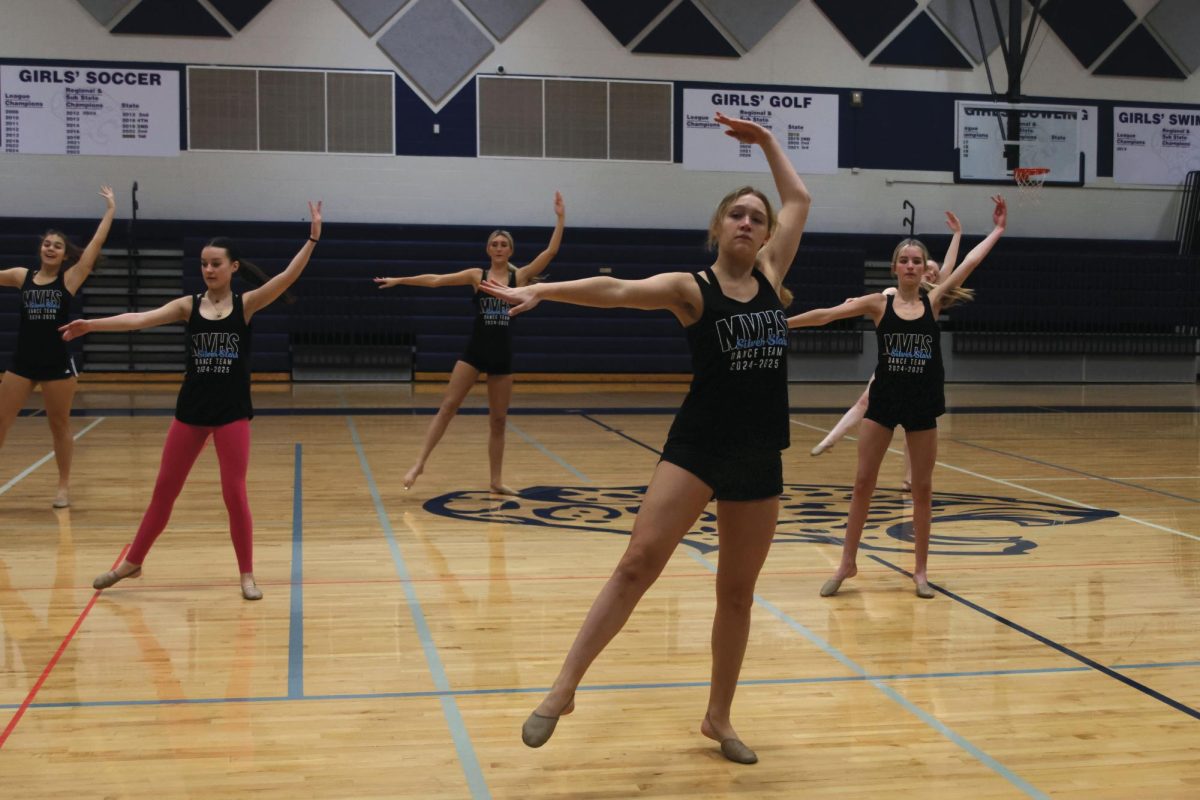 Senior Ashley Ayers leads the group as she goes over the next steps in the routine on Jan. 15