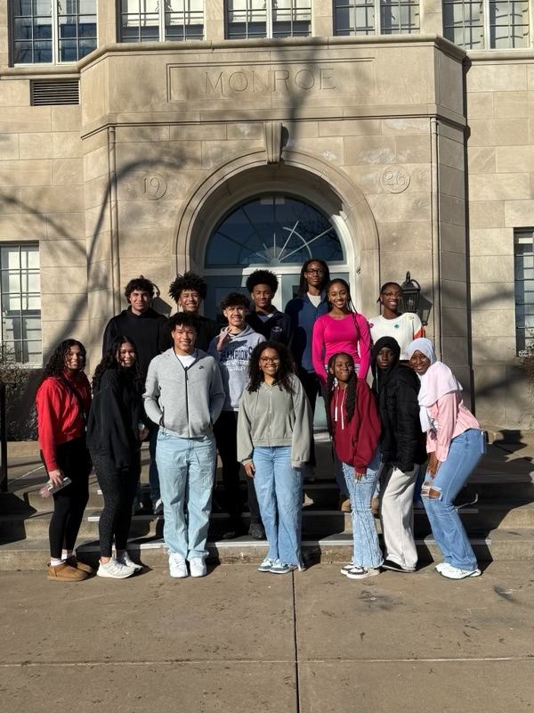 The Black Student Union poses in front of the Brown v. Board of Education Museum