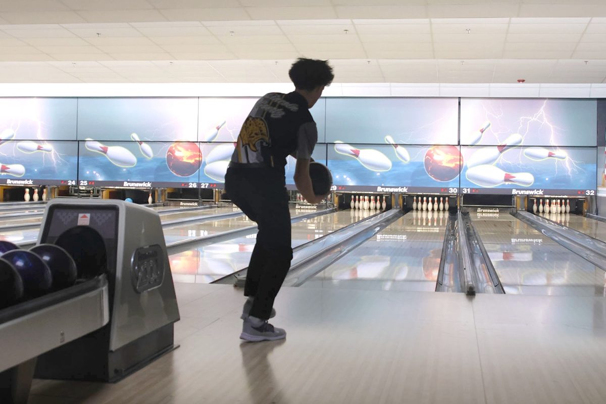 Two handed bowling, sophomore Lincoln Goertz knows just where to throw the ball, Tuesday, Feb. 4.