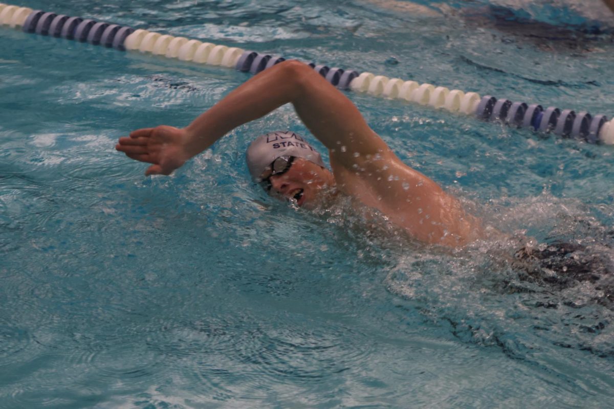 Back in the pool, sophomore Andrew Martin improves on his freestyle stroke, Mar. 7.